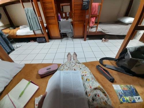 Alyssa on her bed studying