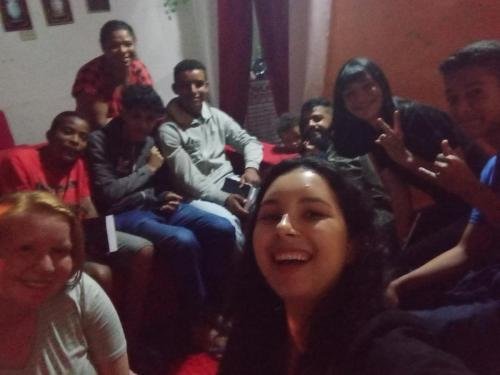 Alyssa and Sister Perri teaching a lesson with a ton of youth from the ward