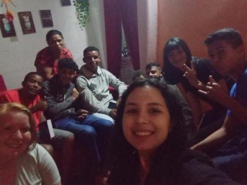 Alyssa and Sister Perri teaching a lesson with a ton of youth from the ward