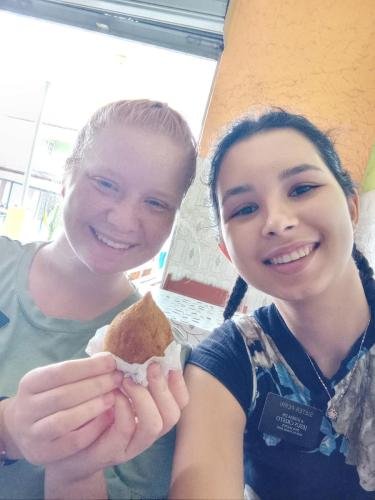 Alyssa and Sister Perri with a dessert