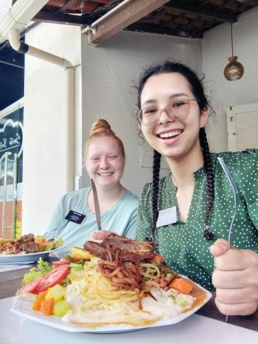 Alyssa and Sister Perri with some huge plates of food