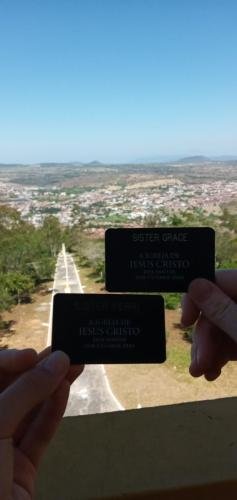 Alyssa and Sister Perri with their name tags on top of the Chapel on the hill