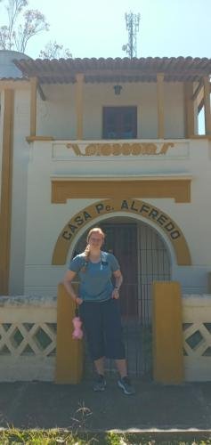 Alyssa in front of Casa Pe. Alredo in Bom Conselho