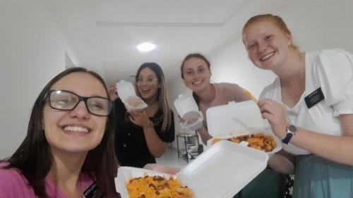 Alyssa and the other sisters with some great looking food