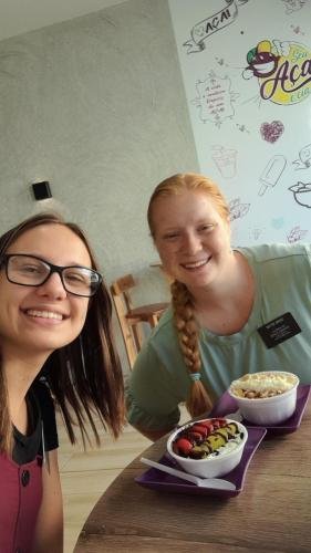 Alyssa and Sister Leopoldes in a restaurant with some food