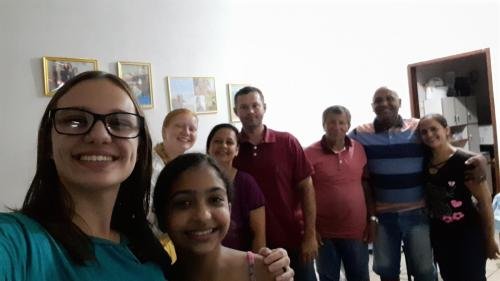 Alyssa and Sister Leopoldes with a large group of members