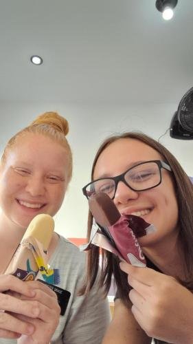 Alyssa and Sister Leopoldes enjoy some chocolate ice cream