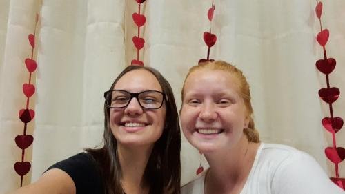 Alyssa and Sister Leopoldes in front of the heart curtain