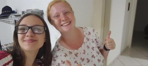 Sister Leopoldes and Alyssa with Alyssa's big thumbs up and sunburned neck