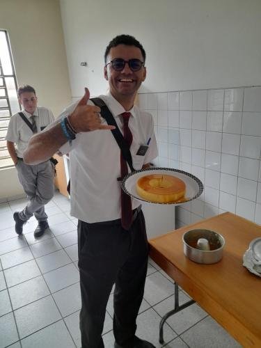 The elders with a big plate of flan