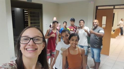 Alyssa and Sister Leopoldes saying goodbye to some Bom Conselho ward members