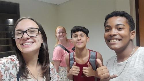 Alyssa and Sister Leopoldes saying goodbye to some Bom Conselho ward members