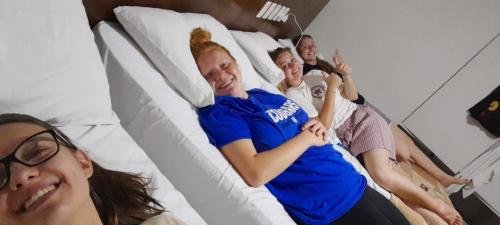 All four sisters in their hotel beds the night before Zone Conference
