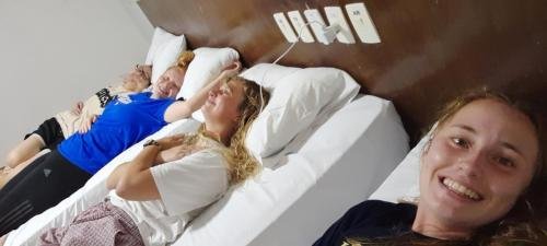 All four sisters in their hotel beds the night before Zone Conference