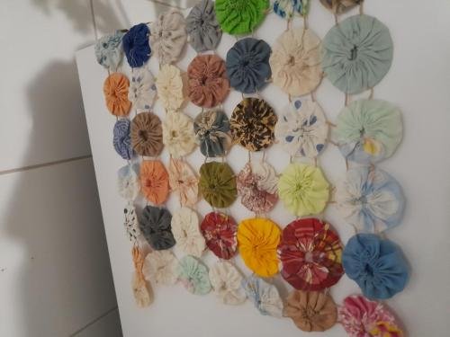 Some yo-yo decorations on a member's fridge