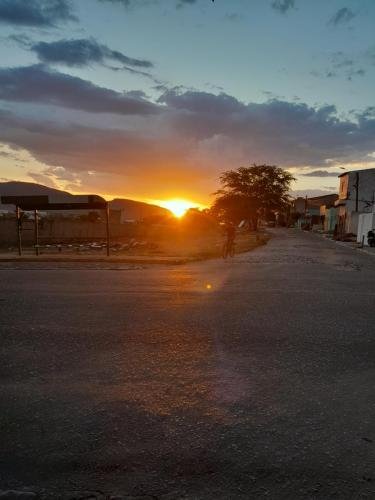 A biker on the road during an Arcoverde sunset