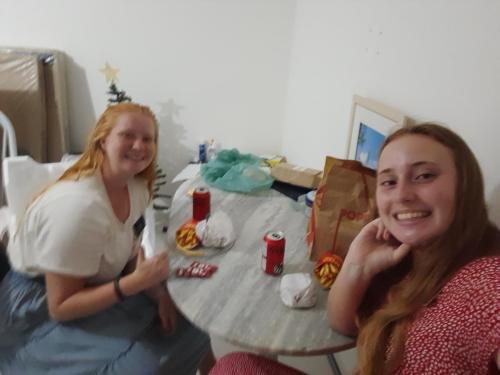 Alyssa and Sister Fuller enjoy hamburgers and fries