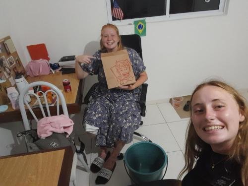 Alyssa and Sister Fuller prepare to eat hamburgers