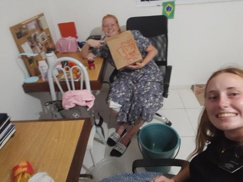 Alyssa and Sister Fuller prepare to eat hamburgers