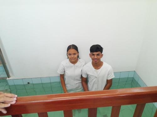 Maria Alice in the font before her baptism