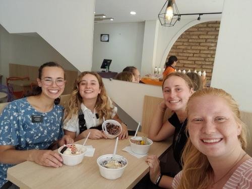 Alyssa with Sisters Fuller, Brewer and Mugerian enjoying acai bowls