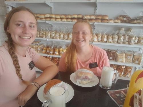 Alyssa and Sister Fuller eating in a restaurant