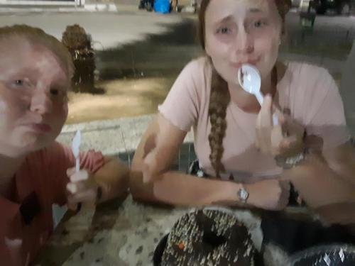 Alyssa and Sister Fuller eat some cake