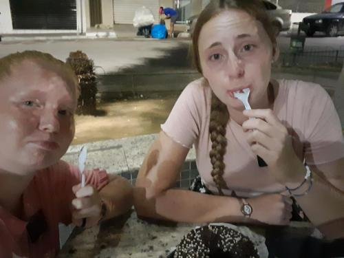 Alyssa and Sister Fuller eat some cake