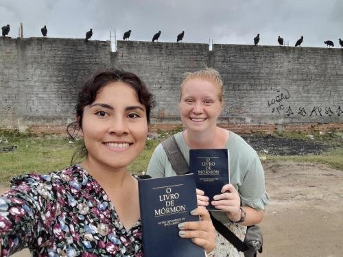Alyssa & Sister Zurita by a Wall Full of Birds