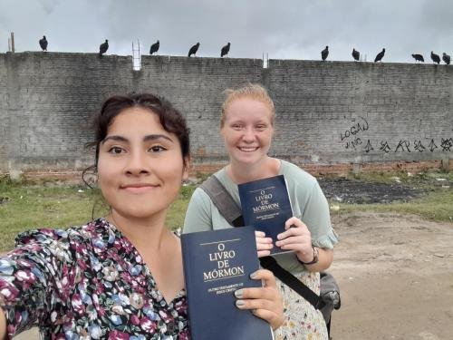 Alyssa & Sister Zurita by a Wall Full of Birds