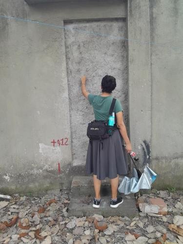 Sister Zurita knocks on a sealed door