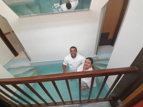 Angelita in the font ready for her baptism