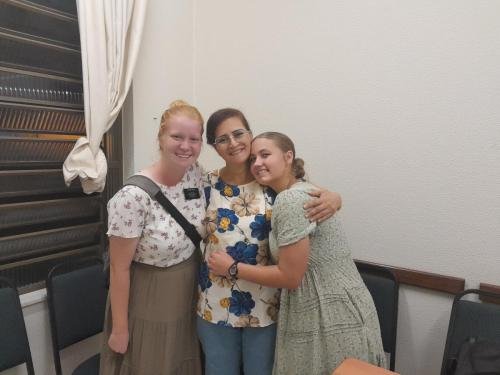 Alyssa and Sister Massey with a ward member
