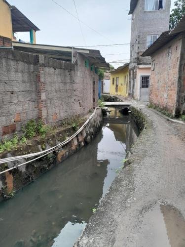 A walkway near a sewage pond