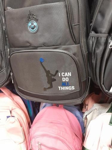 A knockoff of a Nike backpack logo and saying