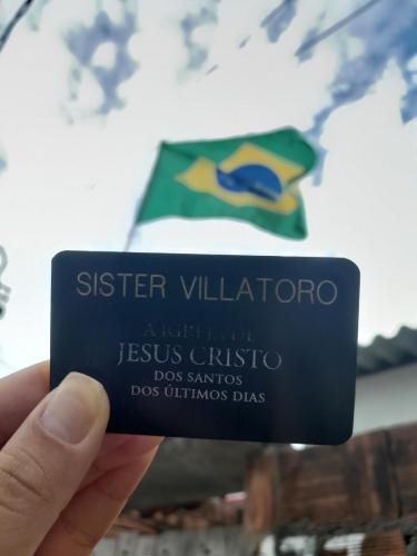 Sister Villatoro's name take with a Brazillian flag