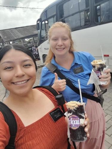 Alyssa and Sister Villatoro with big cups of acai