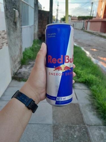 Alyssa holding a big can of Red Bull