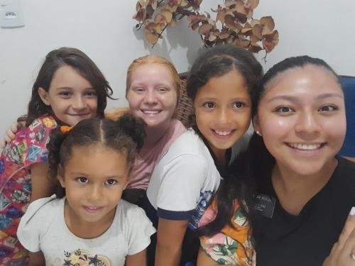 Alyssa and Sister Villatoro with a group of little girls