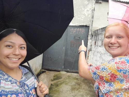 Alyssa and Sister Villatoro in front of a door