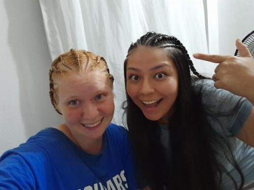 Alyssa and Sister Villatoro with their new braids in their hair