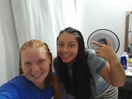 Alyssa and Sister Villatoro with their new braids in their hair