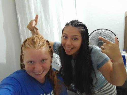 Alyssa and Sister Villatoro with their new braids in their hair