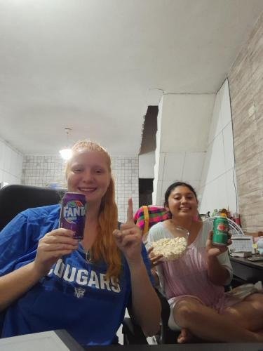 Alyssa and Sister Flores with pop corn and soda