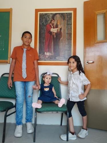 Some chidlren at the church house