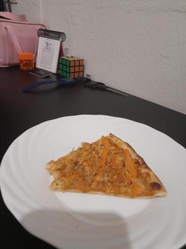 A slice of pizza that Alyssa enjoyed on her mission