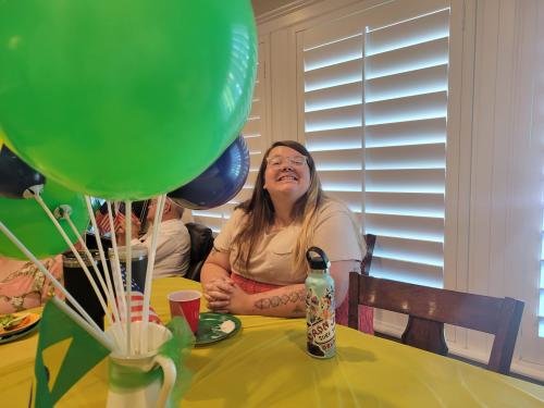 Abi sits at the temple during Alyssa's mission farewell open house