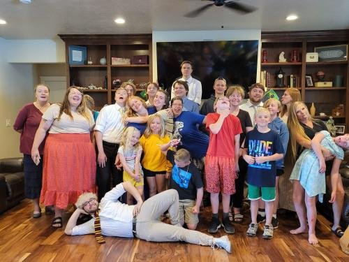 Alyssa with the cousins at her missionary farewell open house