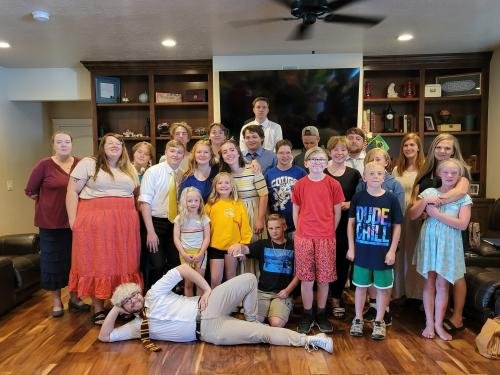 Alyssa with the cousins at her missionary farewell open house