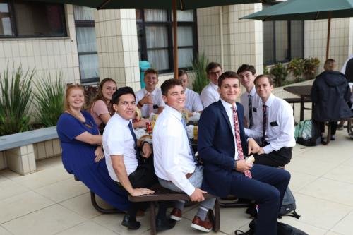 Alyssa eats with her district after arriving at the Brazil MTC